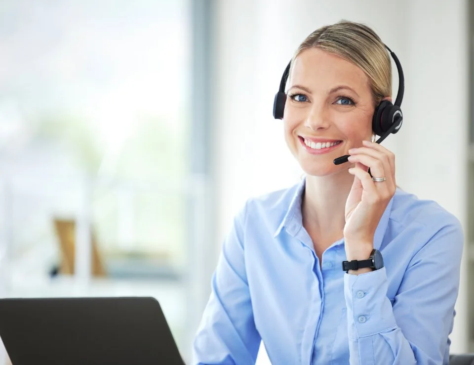 Customer support representative with headset